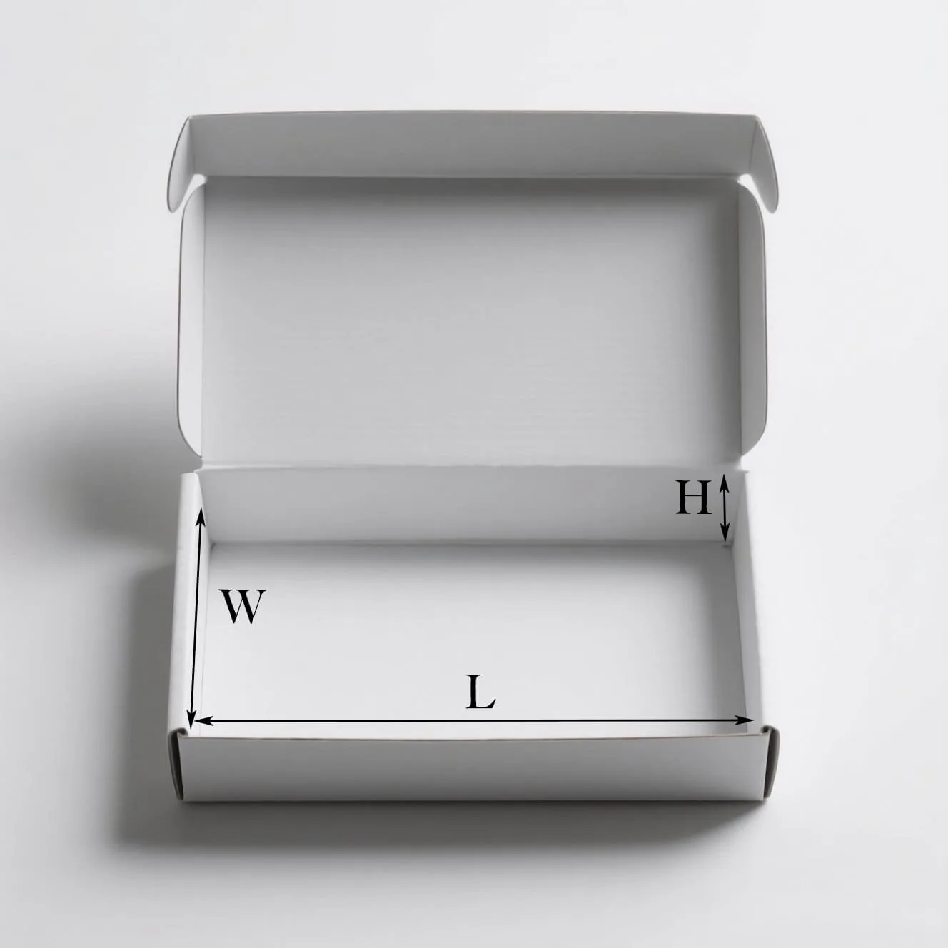 A diagram showing the difference between internal and external box dimensions