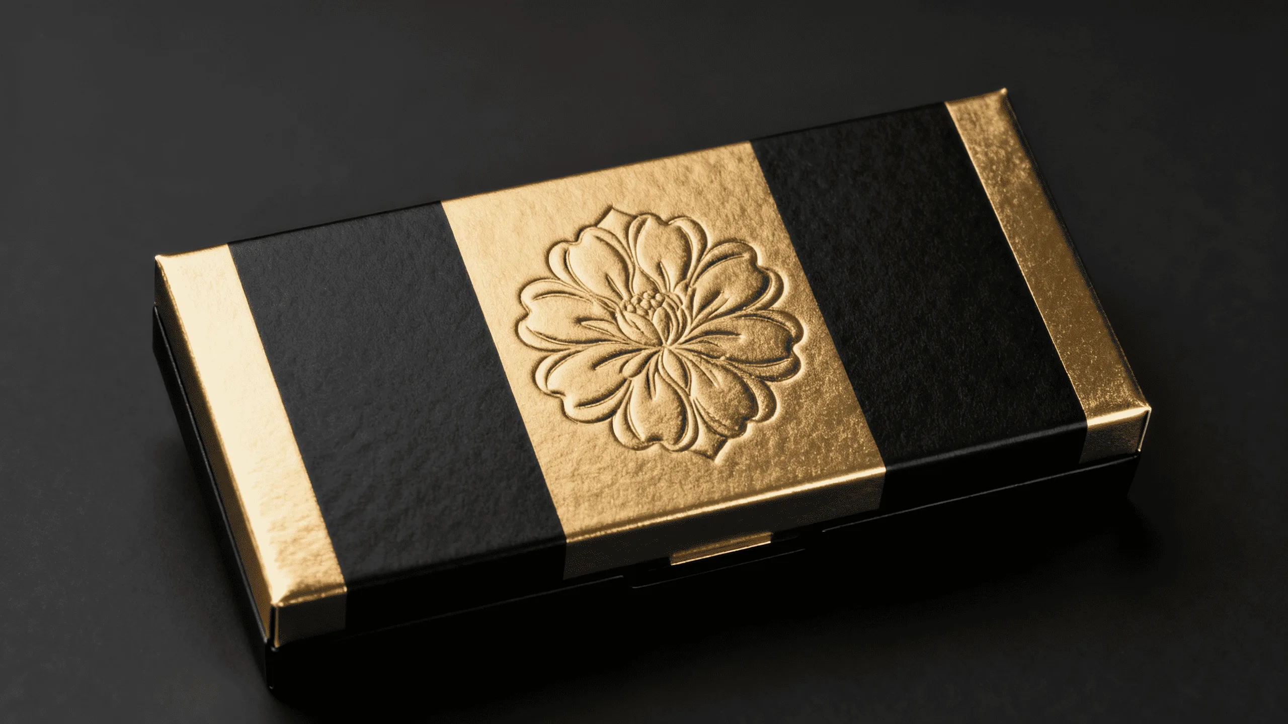 A stunning cosmetic box that uses a combination of gold foil, embossing, and a matte texture to create a complete luxury experience.