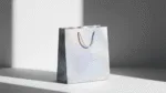 what are the key design & brand strategy considerations when introducing holographic paper bags