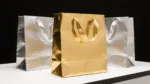 why are gold and silver cardboard paper bags gaining momentum in premium retail packaging