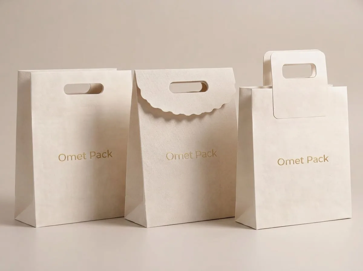 Die-cut integrated handle paper bags