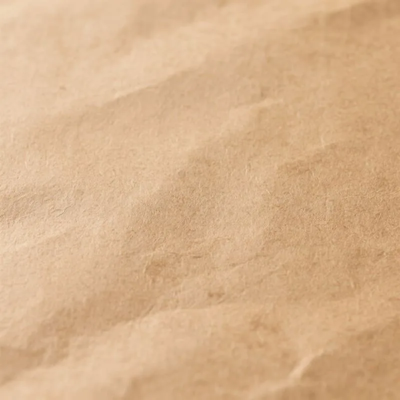 Natural brown kraft paper surface texture Natural kraft paper texture used in packaging