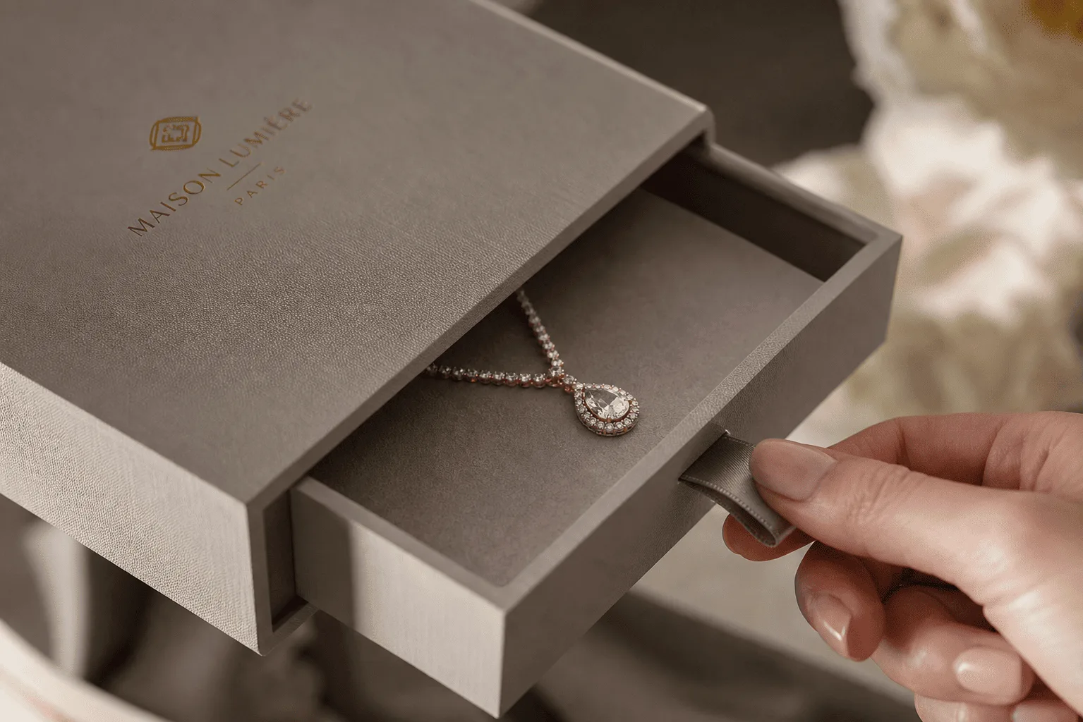 alt: A close-up of a luxury rigid drawer box for a watch, showing the smooth pull action and quality materials.